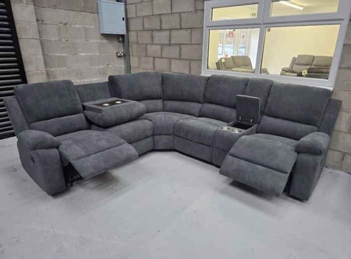 MESSIVE SALE ON RECLINER COUCHES.Drop down cupholders with  wireless chargers and USB ports. Corner Couches and 3+2 sets instock