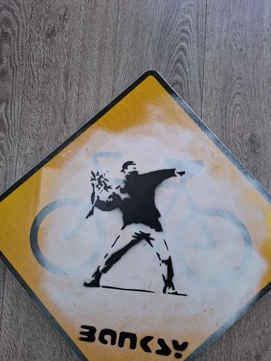 Banksy Sheet Metal Reproduction Road Sign of The Flower Bomber