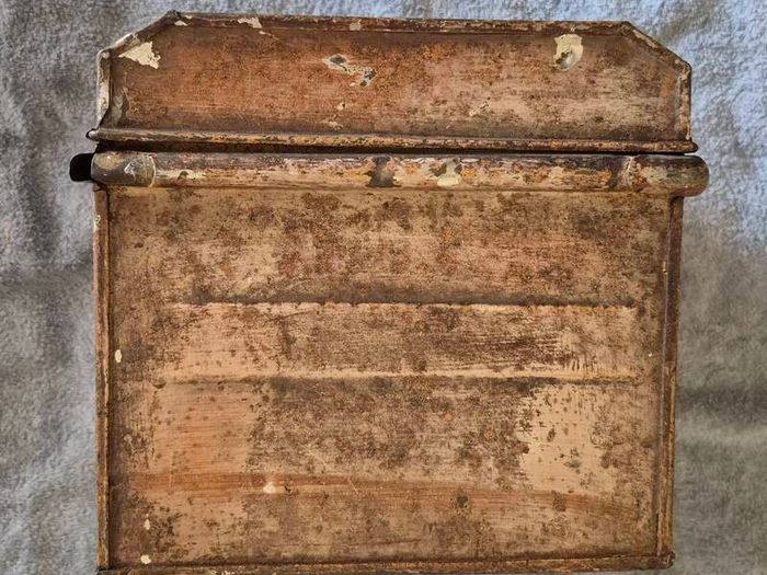 Small vintage metal trunk.
