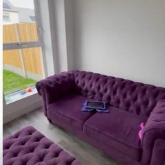 purple chesterfield sofa