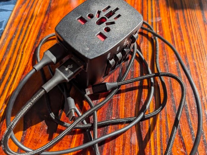 Universal Travel Adapter (4x USB) + USB-C & Lightning Cables