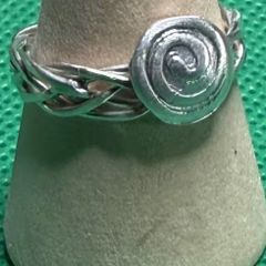Handmade sterling silver Celtic spiral woven band ring. Size o