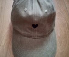 women's cap "love her but leave her wild"