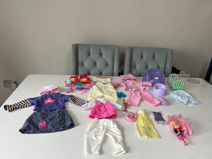Doll clothes and accessories (Preference given to buyer buying any other item at asking price.)