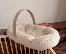 Cozy lounger with activity arch - Done By Deer