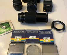 PENTAX 35mm film camera with lenses, filters & bag
