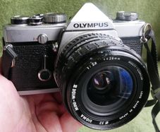 Olympus OM-1 MD 35mm SLR Film Camera & Sigma 2.8 28mm (works well)