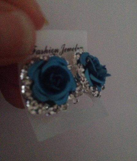 Brand new Turquoise / light blue Rose & Diamond earrings