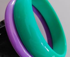 Purple & green plastic bangle bracelets