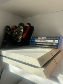Playstation 4 with 3 controllers & 4 games