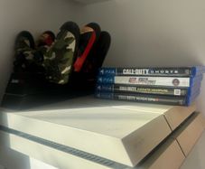 Playstation 4 with 3 controllers & 4 games