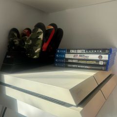 Playstation 4 with 3 controllers & 4 games