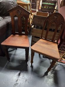 two gothic style chairs