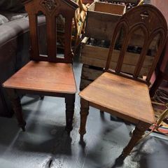 two gothic style chairs