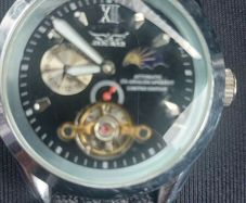 black dial  open-heart movement black paracord strap.