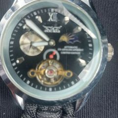 black dial  open-heart movement black paracord strap.
