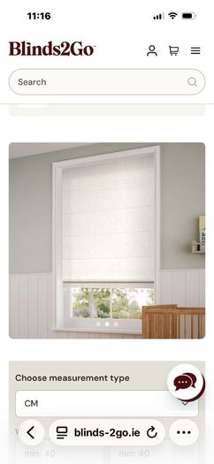 Pair of Cream Roman blinds