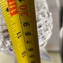 4-arm Flower  crystal tealight candle holder with a metal stand. Image 9