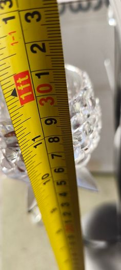 4-arm Flower  crystal tealight candle holder with a metal stand.