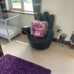Swivel black leather hand chair