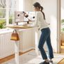 110 x 54 Electric Standing Desk ONE PIECE Height Adjustable With Memory Smart Panel Sit Stand Table Hooks and Cupholder for Home Office (White Frame+ Maple Desktop) Image 2