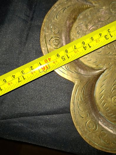 Antique Brass Charger Tray Hand-Engraved Mughal court figures. The Charger has a distinct Scalloped edge and is heavily decorated. Similar items often date from the late 19th century, specifically around the 1870s or 1880s