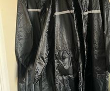 Selling two black raincoats