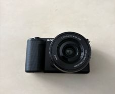 Sony ZV - E10 4K Mirrorless Camera Shutter Count 1808 Comes with, FIFINE XLR Microphone, Mini Tripod, Dummy Battery, Camera Cooling Fan & 4K Video Capture Card