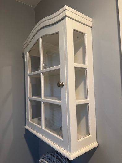 Glass display cabinet