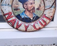 large  players  round metal sign