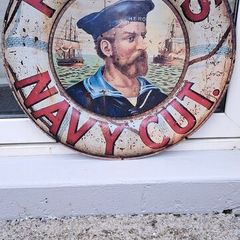large  players  round metal sign