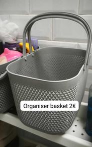 Grey plastic storage basket with handle