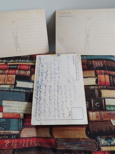 Old postcard album with 80 cards from 1914 to 1955,plus 10 miniature photos of New York,5 old John Hinde,postcards,3 old Iraqui postcards