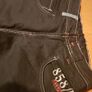 Jeans black denim Next with big back pockets white stitch and print details loose fit brand new pants trousersheight 140cm 10years Image 6
