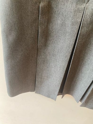 Dunnes grey pinafore (as new) age 8-9