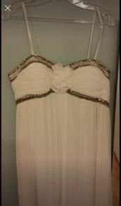 Brand new with tag designer handmade wedding dress by Dresscode. Grecian style with embellishments