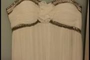 Brand new with tag designer handmade wedding dress by Dresscode. Grecian style with embellishments