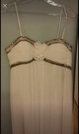 Brand new with tag designer handmade wedding dress by Dresscode. Grecian style with embellishments