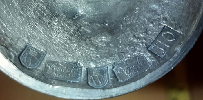 two nice stamped pewter goblets/ bud vases