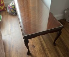 Mahogany coffee table with glass