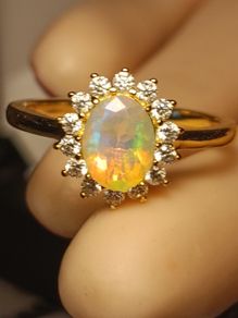 Lovely Quality Natural Ethiopian Opal and Lab Grown Diamond Dress Ring.