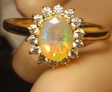 Lovely Quality Natural Ethiopian Opal and Lab Grown Diamond Dress Ring.