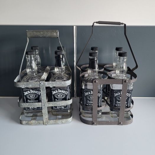 10 empty Jack Daniel bottles