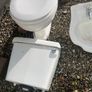 Toilet and cistern , sink and taps Image 2