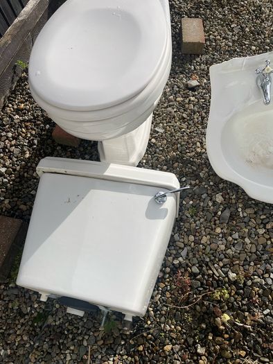 Toilet and cistern , sink and taps