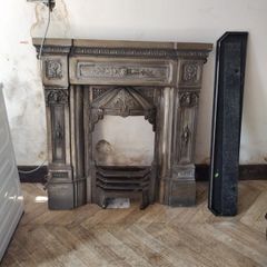 Cast iron fire surround.