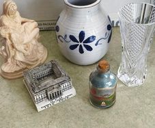 5 Different itmes -GPO Building 3D . 24. 00 euro,  Beautiful sand bottle 14.00 euro. Vintage French Lead Crystal Vase, Cristal d'Arques Small Flower Vase 25.00 euro. Small glazed pottery flower vase 18.00 euro.Vintage Pieta Virgin Mary Cradling Jesus Stat