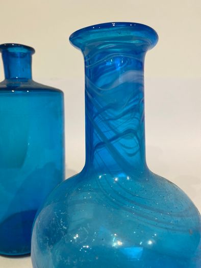 2 vintage blue bottles