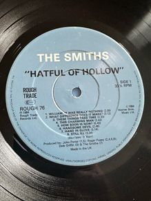 The Smiths. Irish release Hatful of Hollow gatefold sleeve with inner lyrics sleeve in good condition. Vinyl has multiple hair line scratches which affect audio but record doesn't skip hence the low price