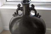 Large dark grey decorative vase with dragon handles
